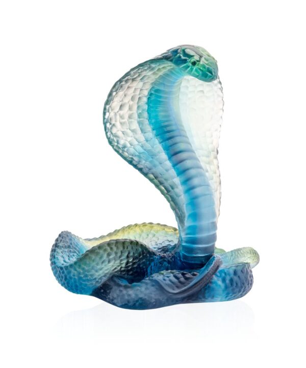 Daum's 'Naja Bleu' sculpture, an expression of a cobra in crystal, capturing the essence of wild beauty.