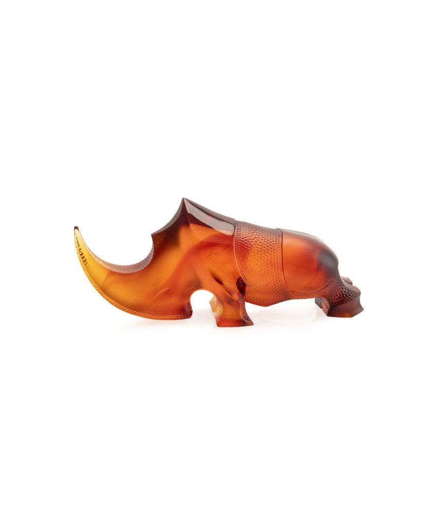 The Ongava Rhinoceros Sculpture by Gé Pellini, a striking expression in pâte de verre, exuding a magnetic presence.