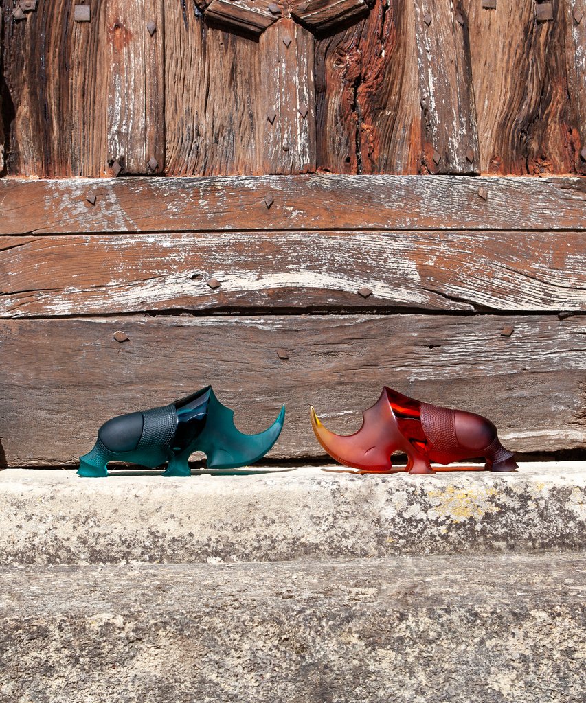 The Ongava Rhinoceros Sculpture by Gé Pellini, a striking expression in pâte de verre, exuding a magnetic presence. - Image 2