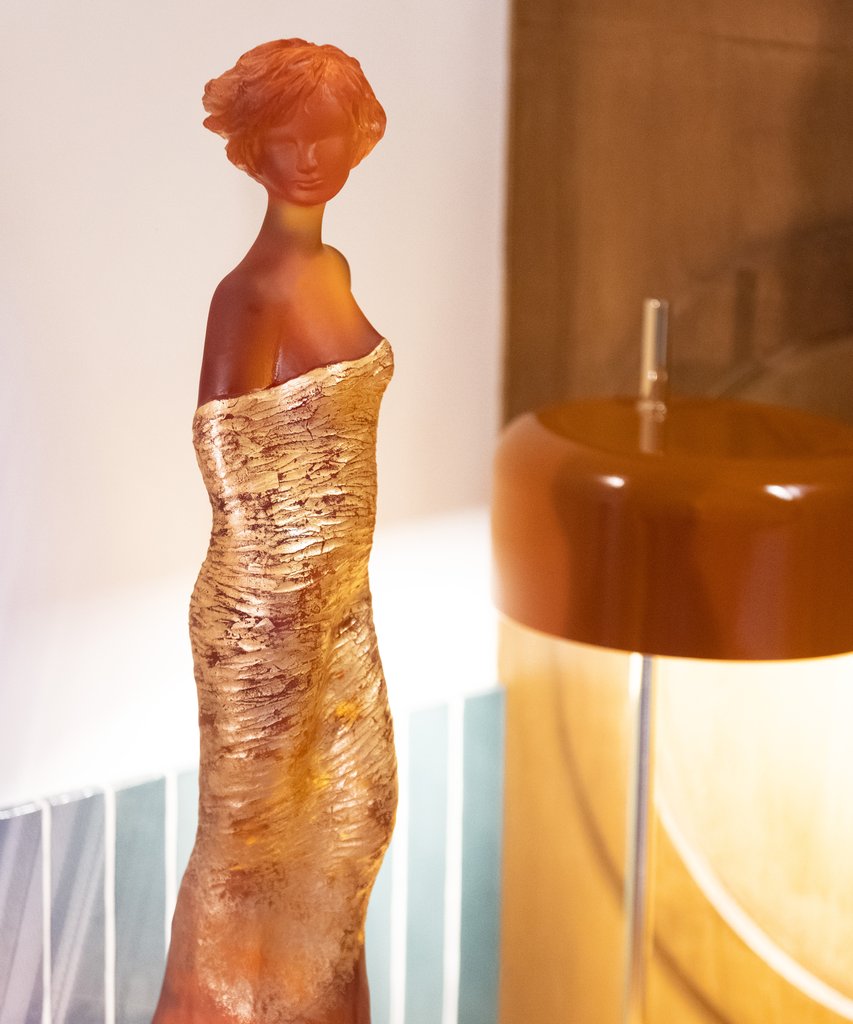 JP Richard's Amber and Gold Galatea feminine sculpture, a striking expression in crystal, radiates illumination with its magnetic presence. - Image 2